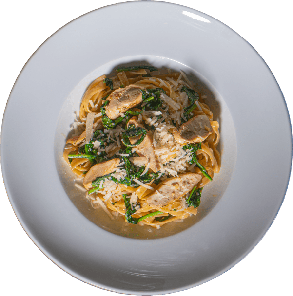 Kura & Imbir Tagliatelle z piersią kurczaka, imbirem i szpinakiem w kremowym sosie z Grana Padano | Restauracja Saska Kępa